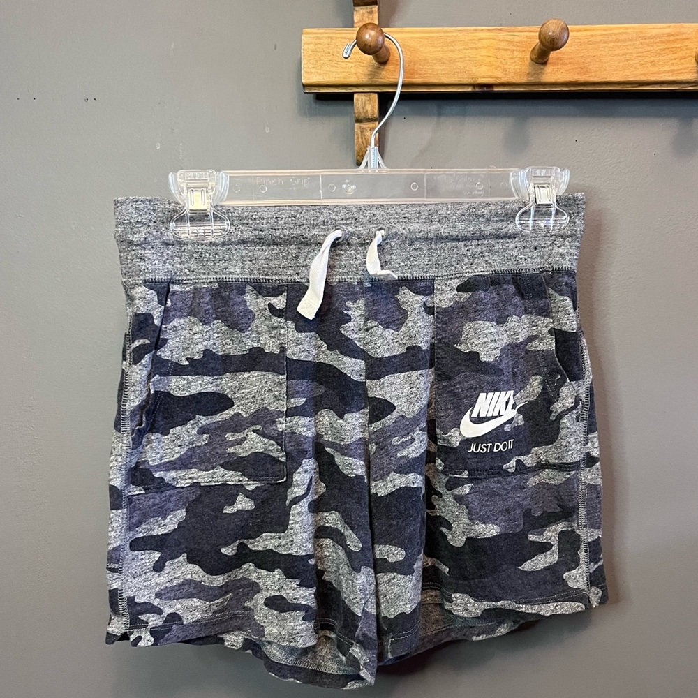 Blue camo nike shorts.